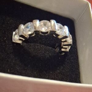 Elegant Sterling Silver forever Band with Cz Stones.